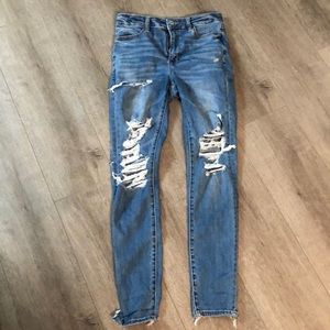 american eagle high rise / waisted ripped jeans